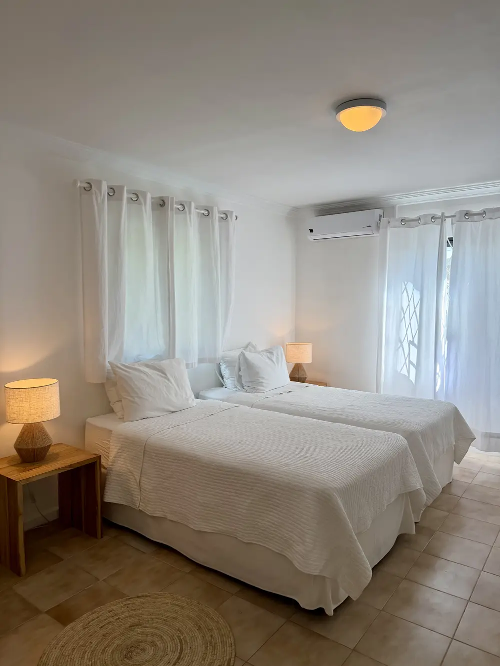 The downstairs bedroom set up as twin beds